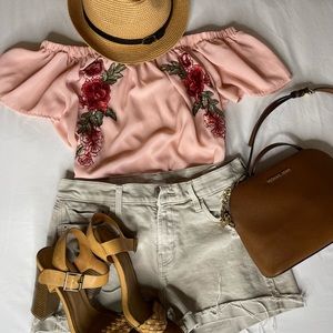 Woman’s rose blouse